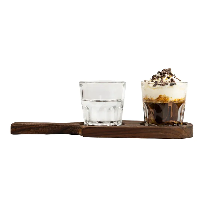 Ver foto de *Espresso Panna-
Espresso con crema de cocoa y avellanas, crema batida y cacao granulado.