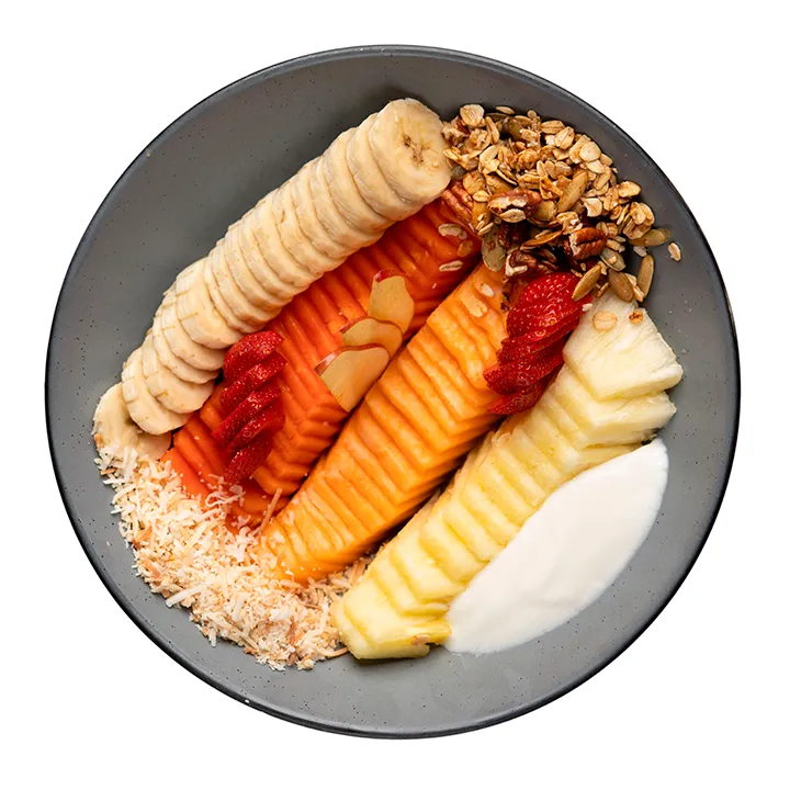 Ver foto de Bowl de Frutas,
Frutas de temporada con granola hecha en casa,
coco tostado, miel y yogurt.